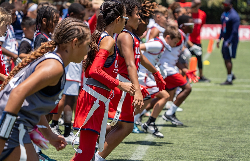 Youth athletes lined up for drills at USA Football Select Bowl training camp practice.