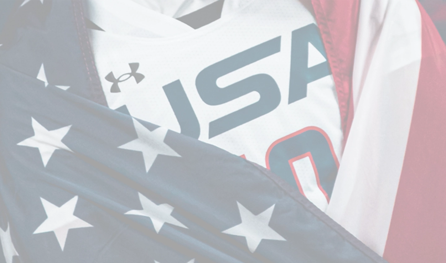Fans cheering on TEAM USA FOOTBALL® during a flag football game.