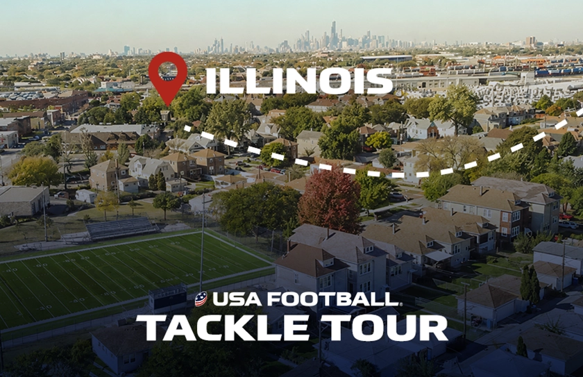 Aerial view of an Illinois football field and neighborhood with USA Football Tackle Tour text overlaying a city skyline.